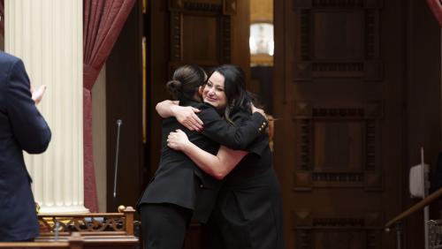 2025 Latino Spirit Award Honoree Marcela Gutiérrez-Graudiņš being introduced to Senators by Latino Caucus Chair, Senate Majority Leader Lena Gonzalez