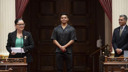 2025 Latino Spirit Award Honoree Jesús Morales being introduced to Senators by Latino Caucus Chair, Senate Majority Leader Lena Gonzalez