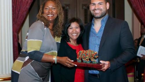 2014 Latino Spirit Award Honoree Cain Velasquez with Senators Holly Mitchell and Norma J. Torres