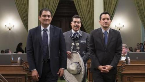 2014 Latino Spirit Award Honoree Ezequiel Peña, Achievement in Arts & Entertainment. Honoree Ezequiel Peña is being escorted by Senator Ben Hueso and Assembly Member Anthony Rendon