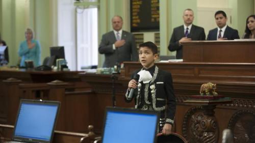 Sebastien de La Cruz sings the Star Spangled Banner before the 2014 Latino Spirit Award ceremony